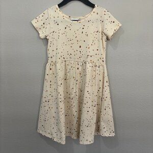 Jax & Lennon white short sleeve dress with various shades of brown shapes
